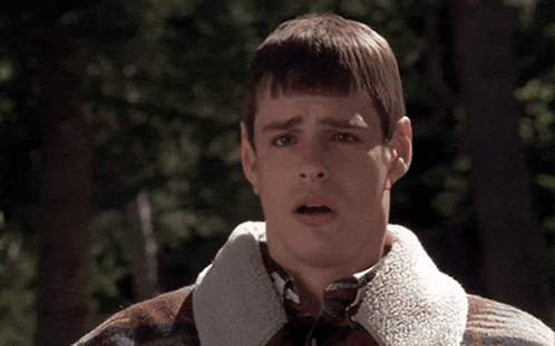 Surprised Man In Plaid Jacket GIF