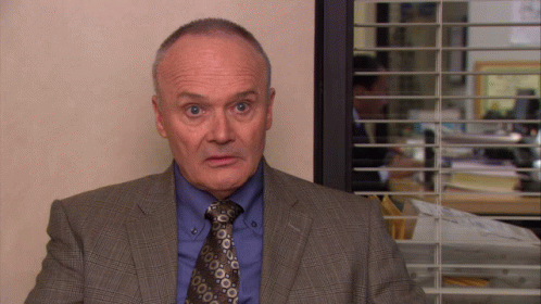 Surprised Man in Suit and Tie