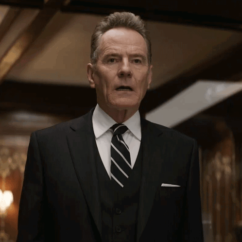 Surprised Man in Suit and Tie