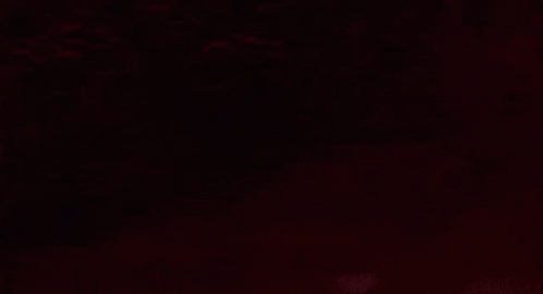 Surprised Man Standing in Dark