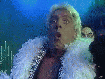 Surprised Man with Feather Boa