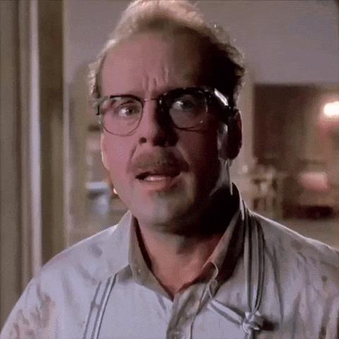 Surprised Man with Glasses and Suspenders