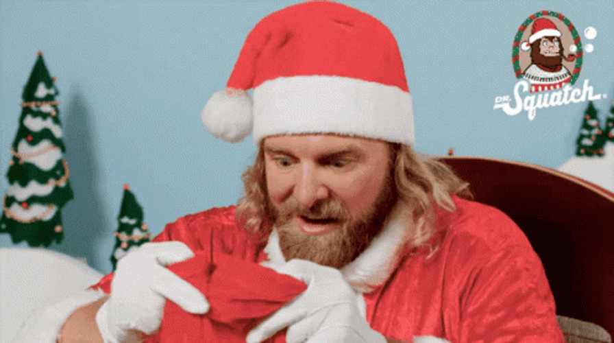 Surprised Santa Opening His Bag GIF
