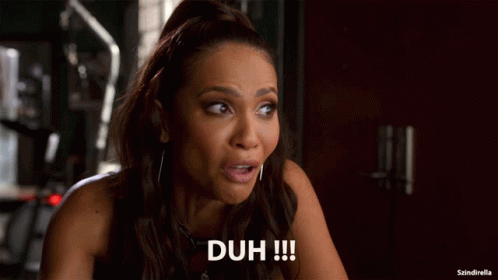 Surprised Woman Saying Duh GIF