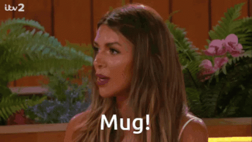 Surprised Woman Saying Mug GIF