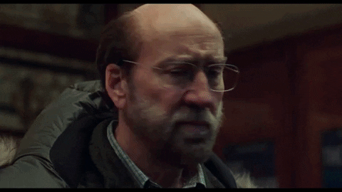 Suspicious Nic Cage Looking Around GIF