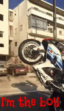 Suzuki Motorcycle Upside Down On Street GIF