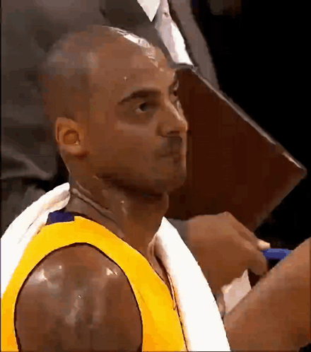 Sweating Basketball Player With Towel Around Neck GIF