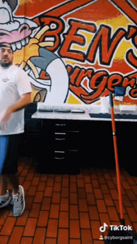 Torn Between To Sweep The Floor Or Not GIF