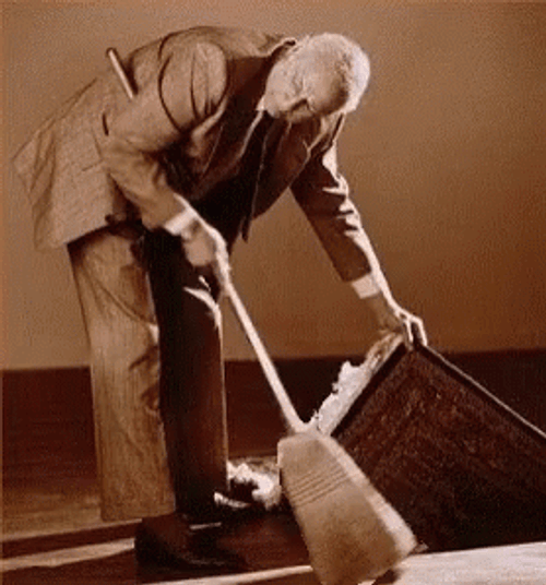 Sweep Something Under The Rug GIF