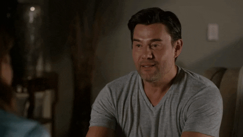 Sweet Couple Near Fireplace GIF