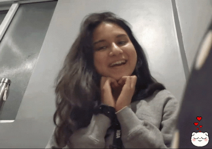 Sweet Girl Wink And Heart Hands GIF