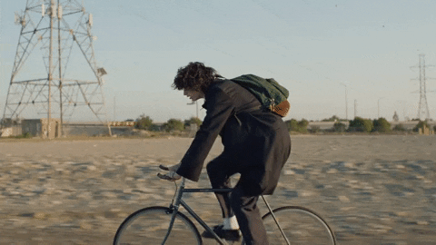 Swiftly Riding Bike GIF