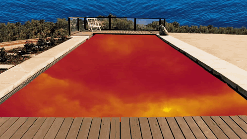 Swimming Pool with Red Cover and Blue Sky