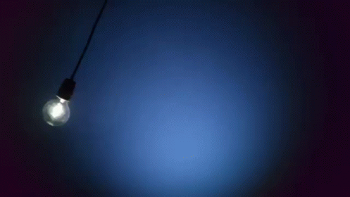 Swinging Light Bulb Blue Vignette GIF