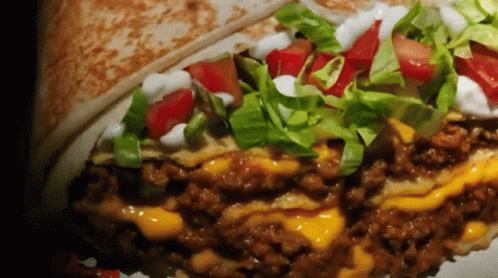 Taco With Meat Cheese and Vegetables