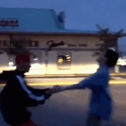 Taekook Spinning While Holding Hands GIF