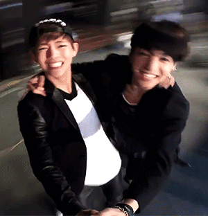 Taekook Spinning With Selfie Pod GIF