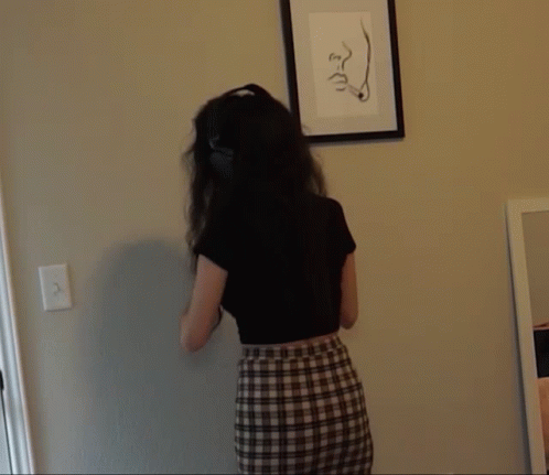 Talking To A Wall Curly Haired Lady GIF