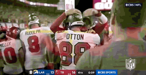 Tampa Bay Buccaneers Cade Otton Hugging Someone GIF
