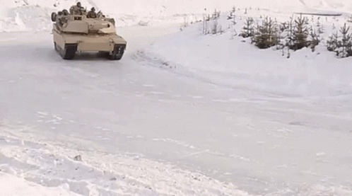Tank Driving on Snowy Road