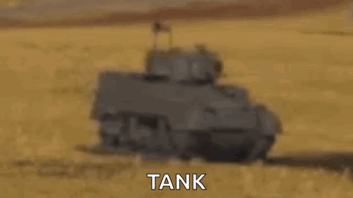 Tank Driving Through Field