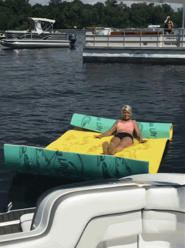 Tanning On Floating Raft GIF