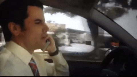 Taparse La Cara An Uber Driver Calling While Driving GIF