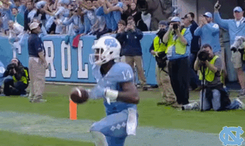 Tar Heels Football Player Kneel Then Stand GIF