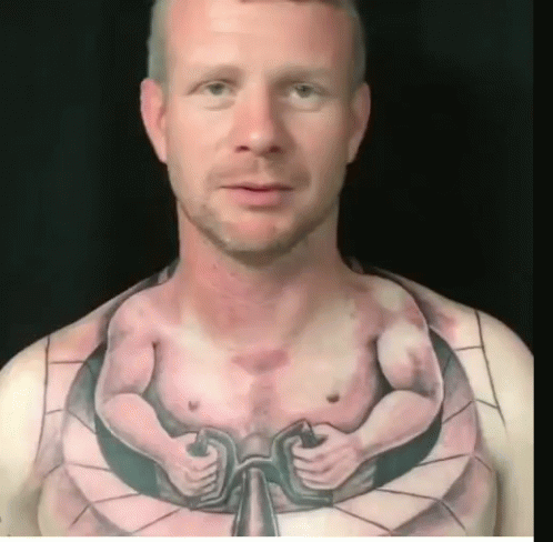 Driving Hand Chest Tattoo GIF