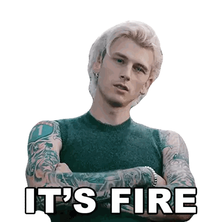 Tattooed Man Standing With Fire Words
