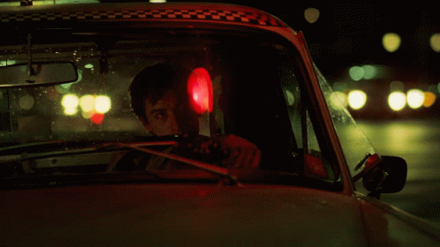 Taxi Driver Travis Bickle Inside Parked Vehicle GIF