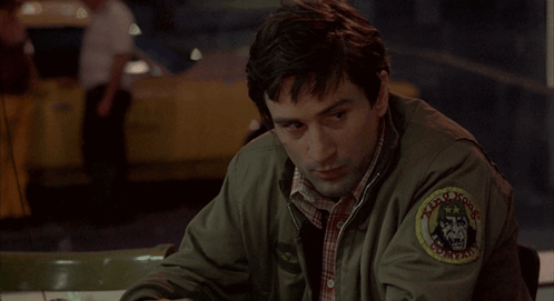 Taxi Driver Travis Bickle Looking To The Side GIF