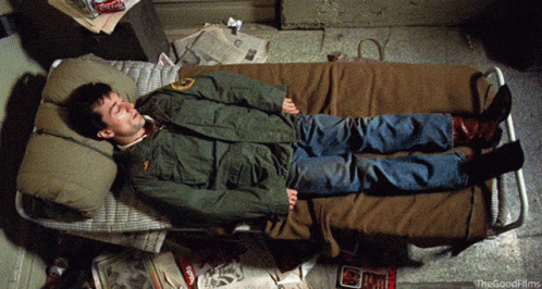 Taxi Driver Travis Bickle Lying On Bed GIF