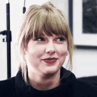 Taylor Swift Close Up With Ponytail and Bangs