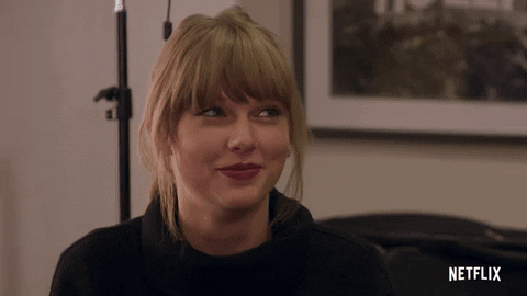 Taylor Swift Cute Shrug GIF