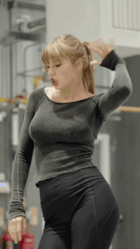 Taylor Swift Dancing With Hands Raise GIF