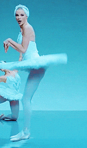 Taylor Swift Hopping Like Bunny Backwards GIF