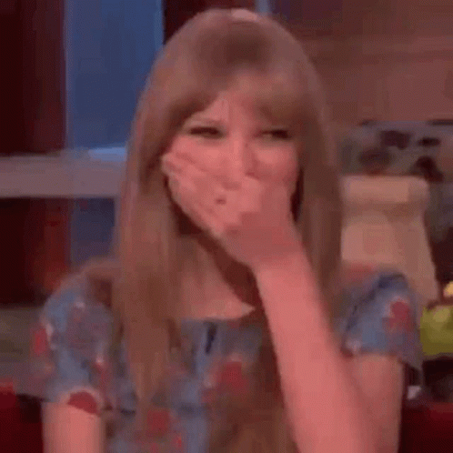 Taylor Swift Laughing Meme GIF