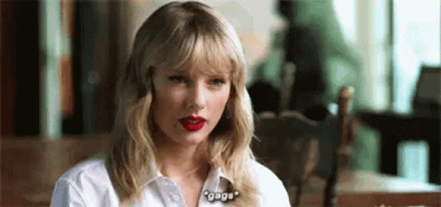 Taylor Swift Red Lipstick White Shirt