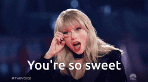 Taylor Swift Says " You 'Re So Sweet " While Holding Her Hand To Her Face GIF