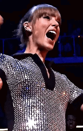 Taylor Swift Screaming in Silver Sequined Shirt