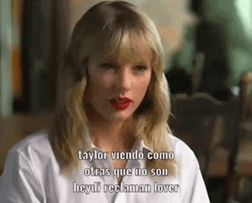 Taylor Swift Tongue Sticking Out Meme GIF