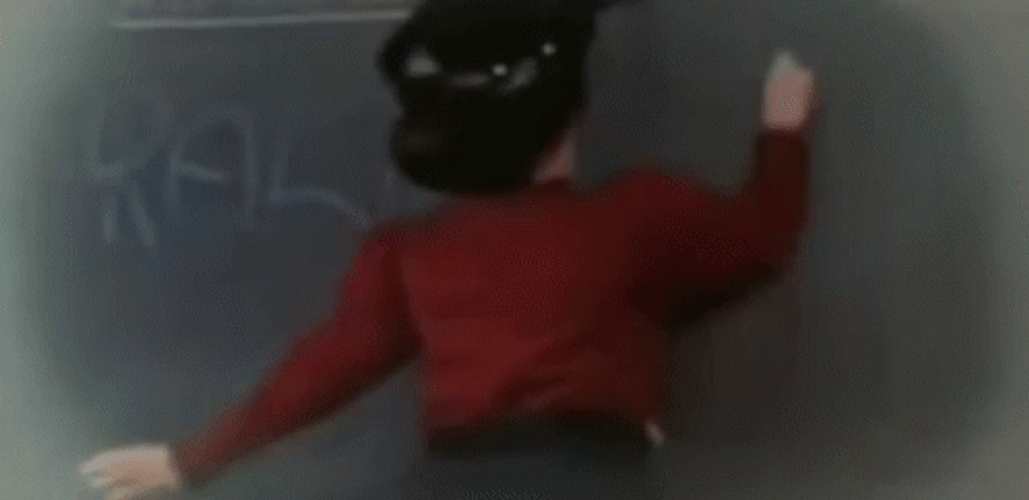 Teacher Writing Christmas Story On The Board GIF
