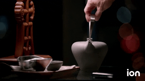 Teapot Water Pouring In Small Bowl GIF