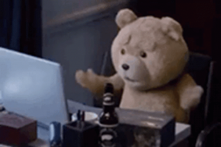 Ted In Front Of Desk GIF