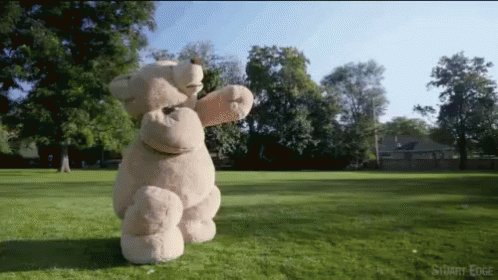 Ted Running On Green Field GIF