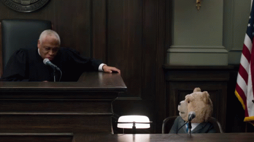 Teddy Bear At Courtroom Microphone GIF