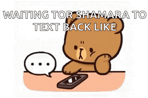 Teddy Bear at Table with Cell Phone and Speech Bubble