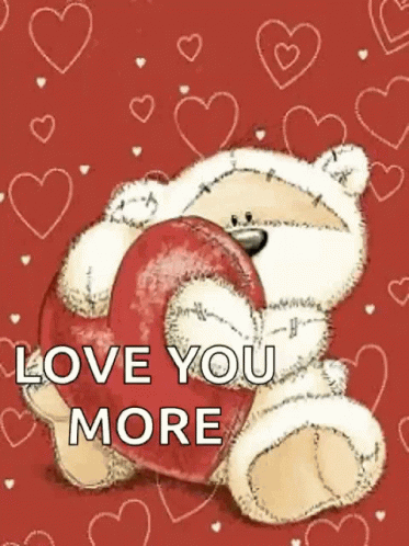 Teddy Bear Holding Red Heart Saying Love You More GIF